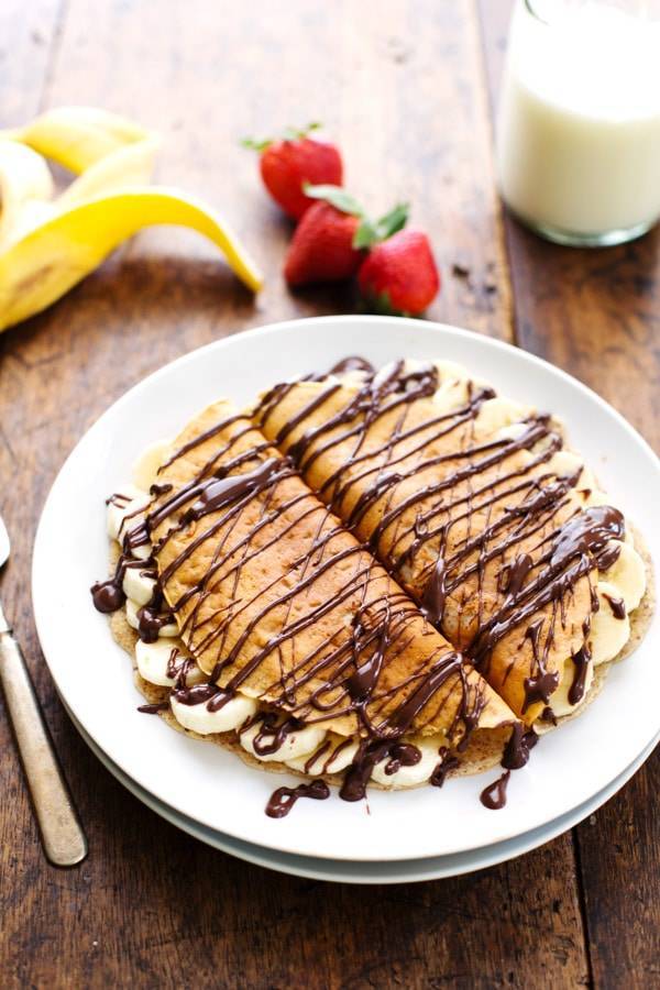 Almond Oat Banana Crepes on a white plate.
