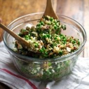 Spring Quinoa Salad with Honey Lemon Vinaigrette - peas, bacon, fresh herbs, almonds. Serve on spinach for fresh take-to-work lunches! | pinchofyum.com