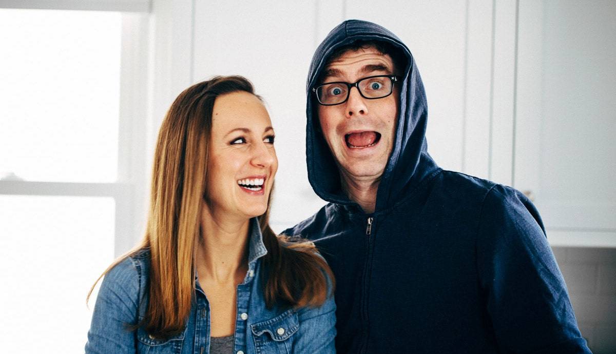 Man and woman making silly faces.