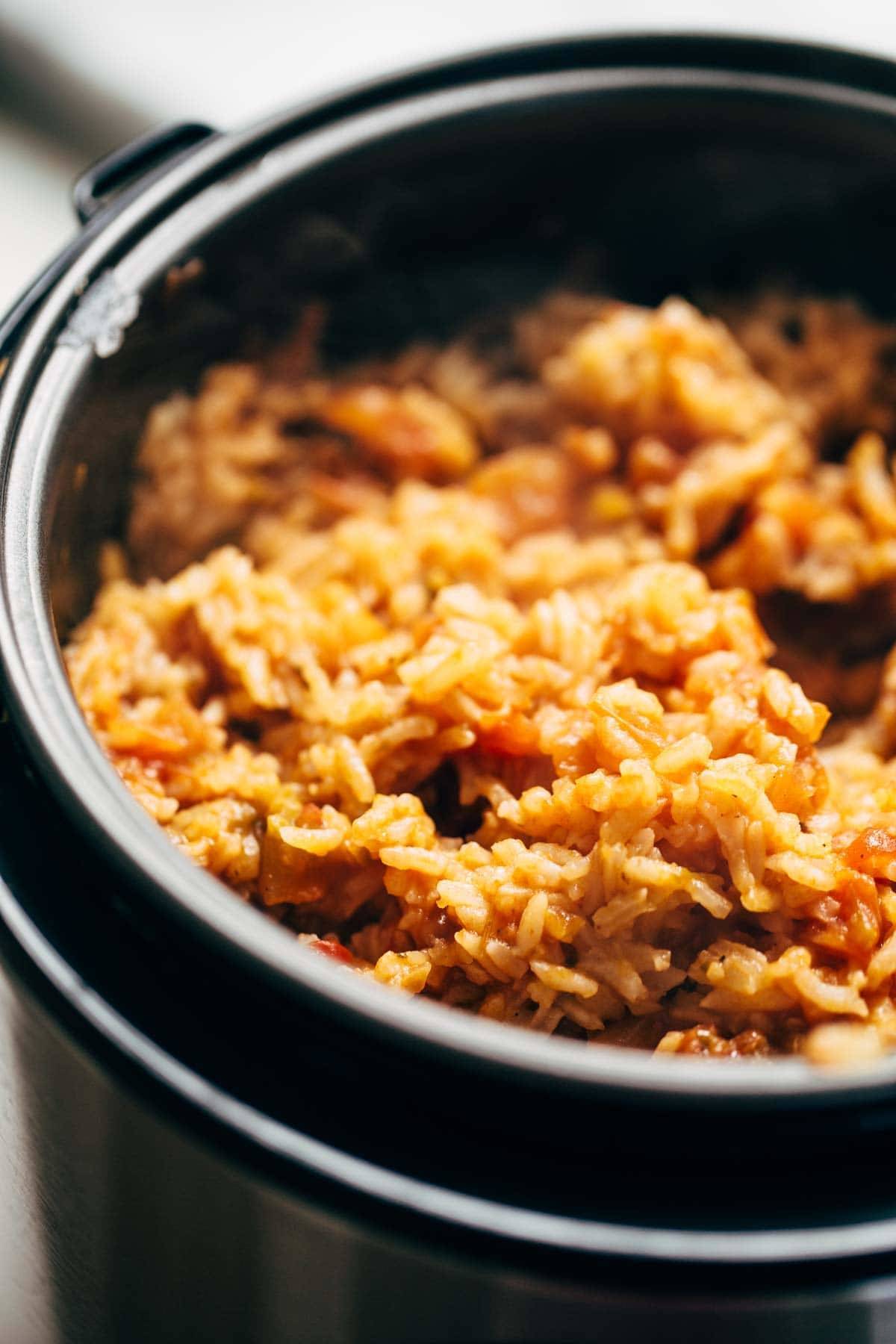 Spicy Brazilian Burrito Bowls recipe featuring seasoned rice and beans, garlic cilantro lime slaw, and crispy fried plantains. So good // almost vegan. | pinchofyum.com Spicy Brazilian Burrito Bowls recipe featuring seasoned rice and beans, garlic cilantro lime slaw, and crispy fried plantains. So good // almost vegan. | pinchofyum.com