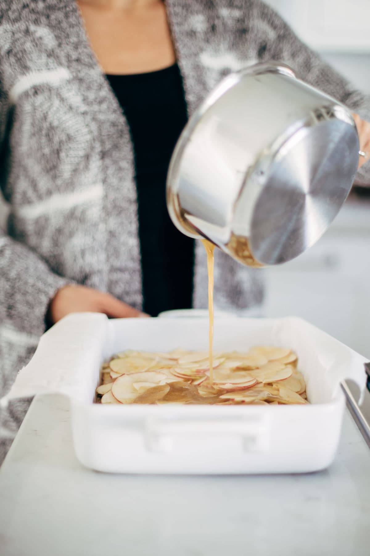 These layered bars are so simple! Loaded with homemade caramel and apples. Caramely apple layer tucked in by a brown sugar-y crust on both sides. | pinchofyum.com These layered bars are so simple! Loaded with homemade caramel and apples. Caramely apple layer tucked in by a brown sugar-y crust on both sides. | pinchofyum.com