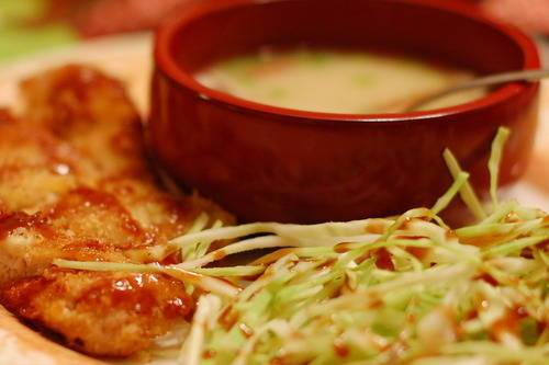 Fried food and soup in a bowl.