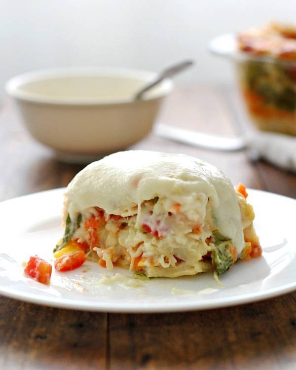 Veggie Alfredo lasagna on a plate.