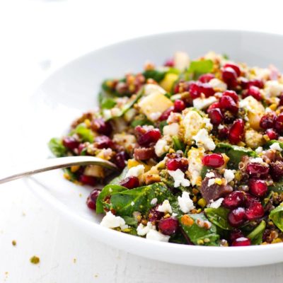 Rainbow Quinoa Salad in a bowl with fork.